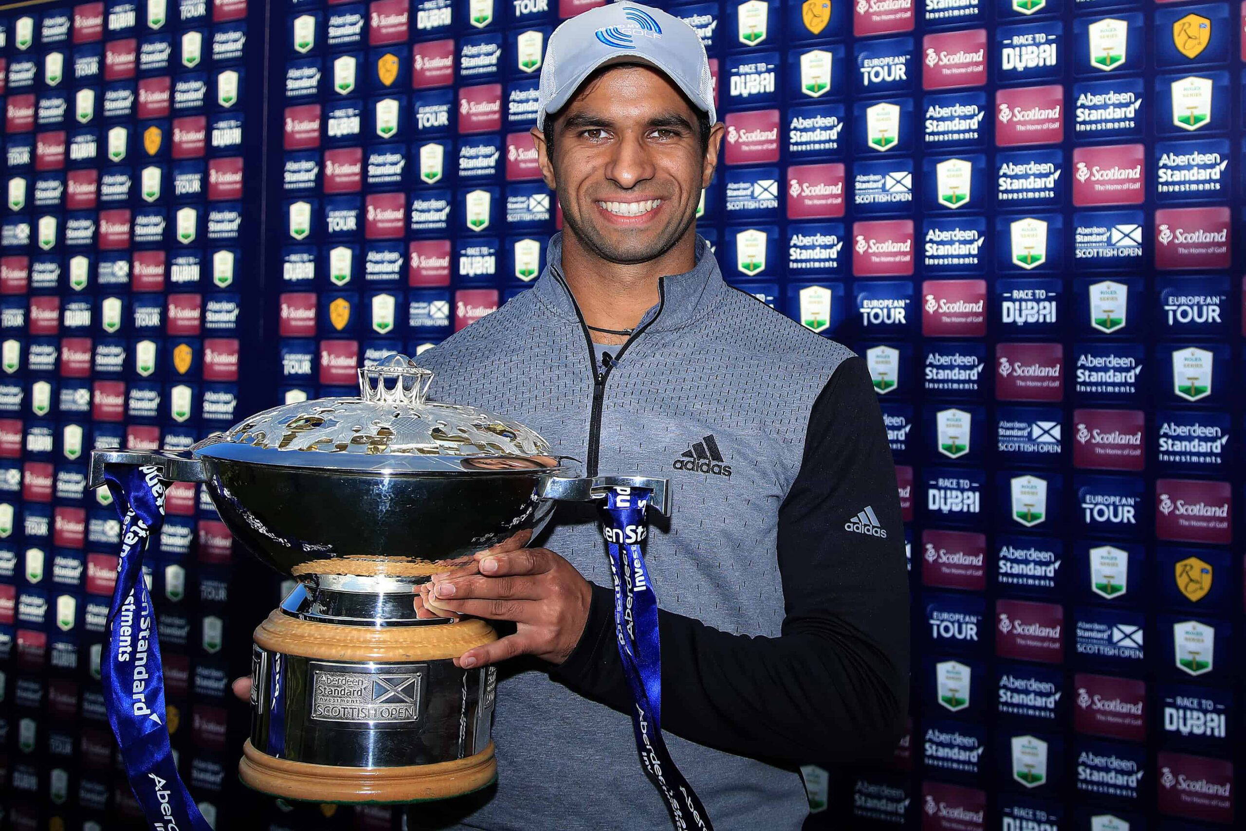 NORTH BERWICK, SCOTLAND - OCTOBER 04: Aaron Rai of England poses with the trophy after beating Tommy Fleetwood of England in a one hole play-off to win the Aberdeen Standard Investments Scottish Open at The Renaissance Club on October 04, 2020 in North Berwick, Scotland. (Photo by Andrew Redington/Getty Images)